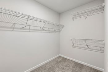 Walk in closet in primary suite